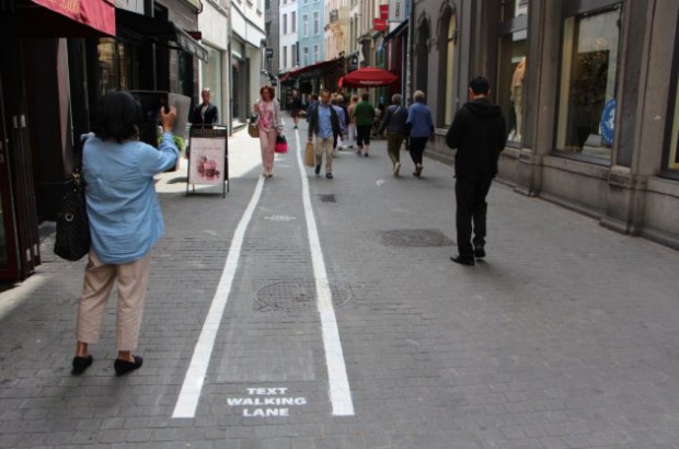 Text walking lanes introduced for phone users, Antwerp, Belgium - 12 Jun 2015